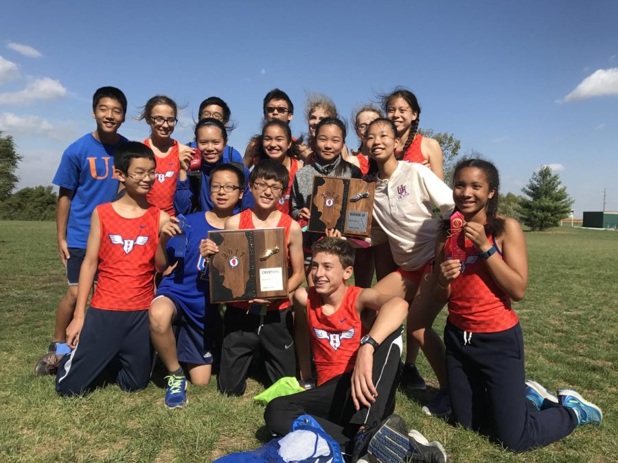 The+subbie+teams+with+their+Sectional+plaques.+The+boys+finished+in+1st+place%2C+and+the+girls+finished+in+2nd.+%28Photo+courtesy+of+Sumi+Yoneji%29