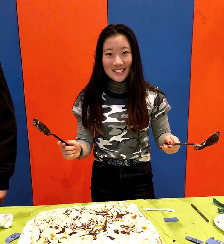 Sophomore+Danbi+Choi+presents+her+chocolate+caramel+sundae+cake.+Choi+won+in+the+%27sweet%27+category+at+Habitat+for+Humanity%27s+annual+bake-off+on+February+11.+Photo+by+Grace+Juhn.