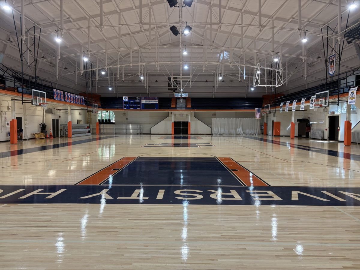 The new floor of Kenney Gym shines after a PE class.