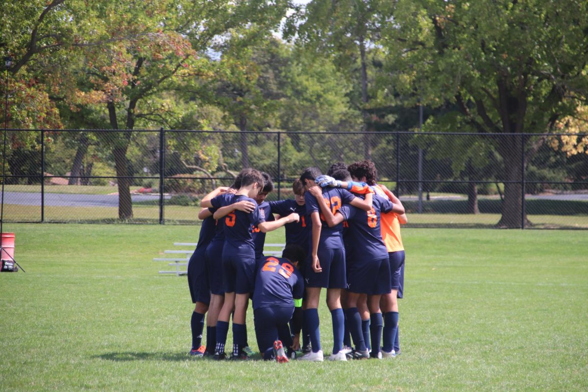 The Uni High Soccer team huddles during senior night on Oct. 9, 2025.