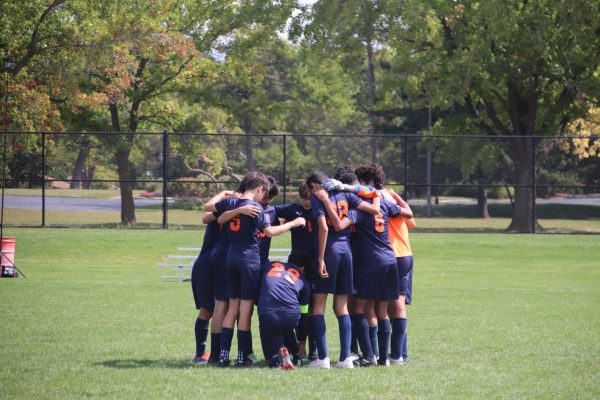 The Uni High Soccer team huddles during senior night on Oct. 9, 2025.