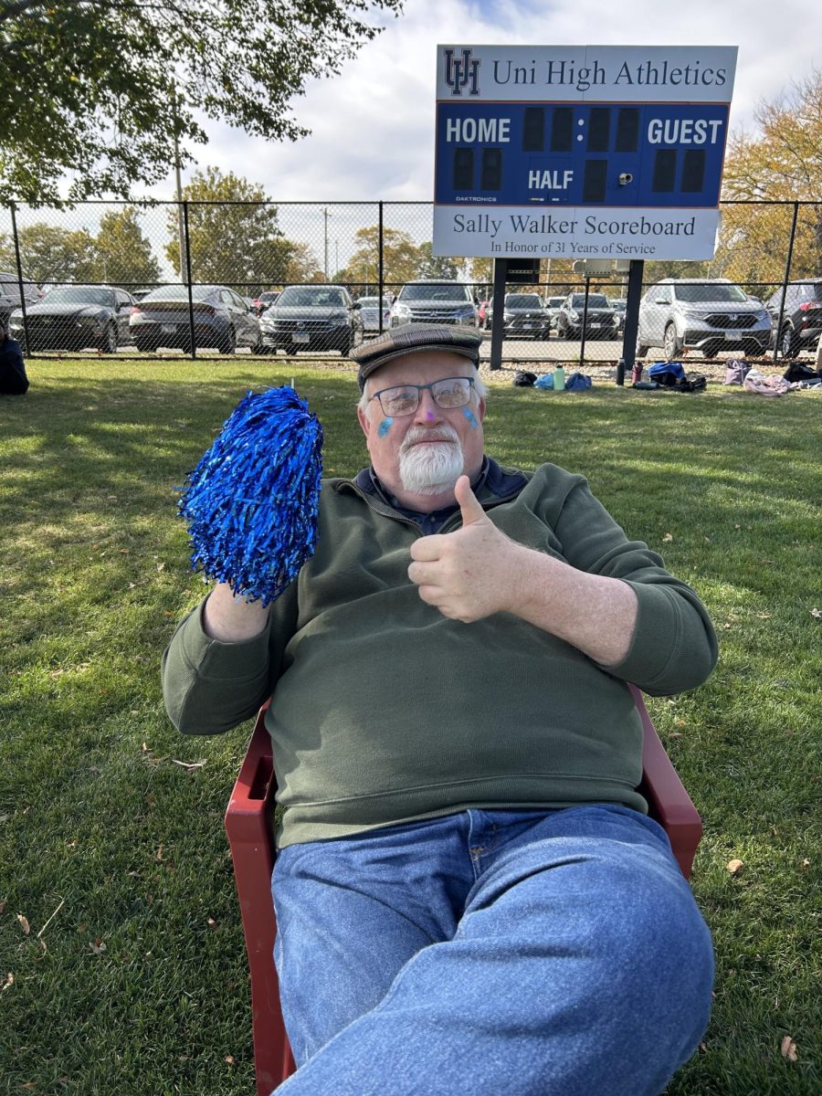 Rick Murphy, Uni music teacher, cheers with festive gear.